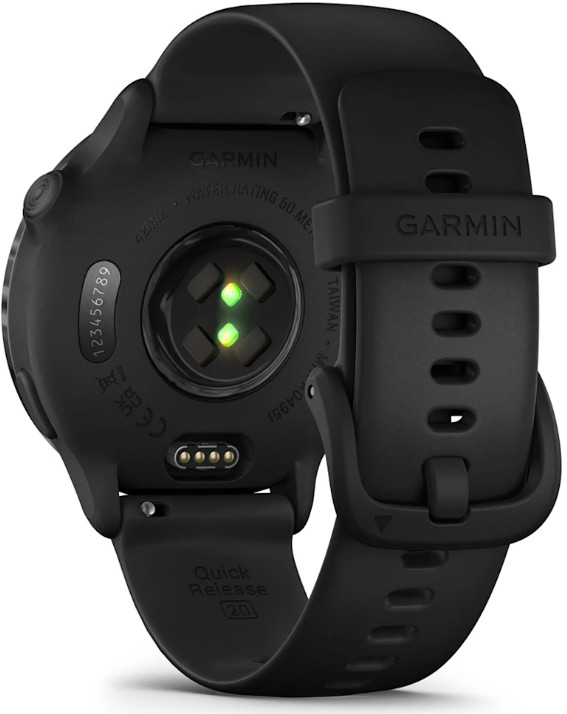 Widok z tyłu czarnego smartwatcha Garmin z czarnym paskiem. Logo Garmin, czujniki i etykiety.
