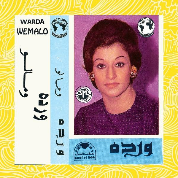 Warda Wernalo Albumcover, zeigt eine Frau mit dunklem Haar, mit arabischem Text und Logo auf gelbem Hintergrund.