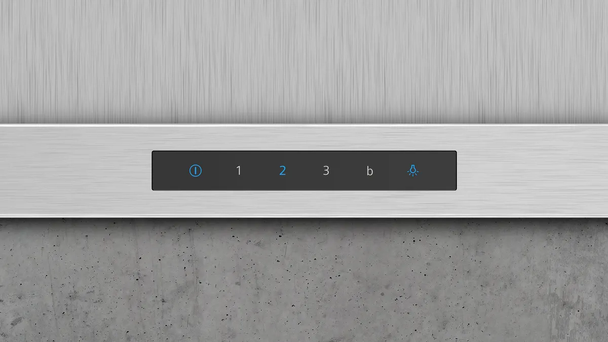Üç düğmeli ve bir simgeli kontrol paneli. Panel gümüş ve gri renktedir.