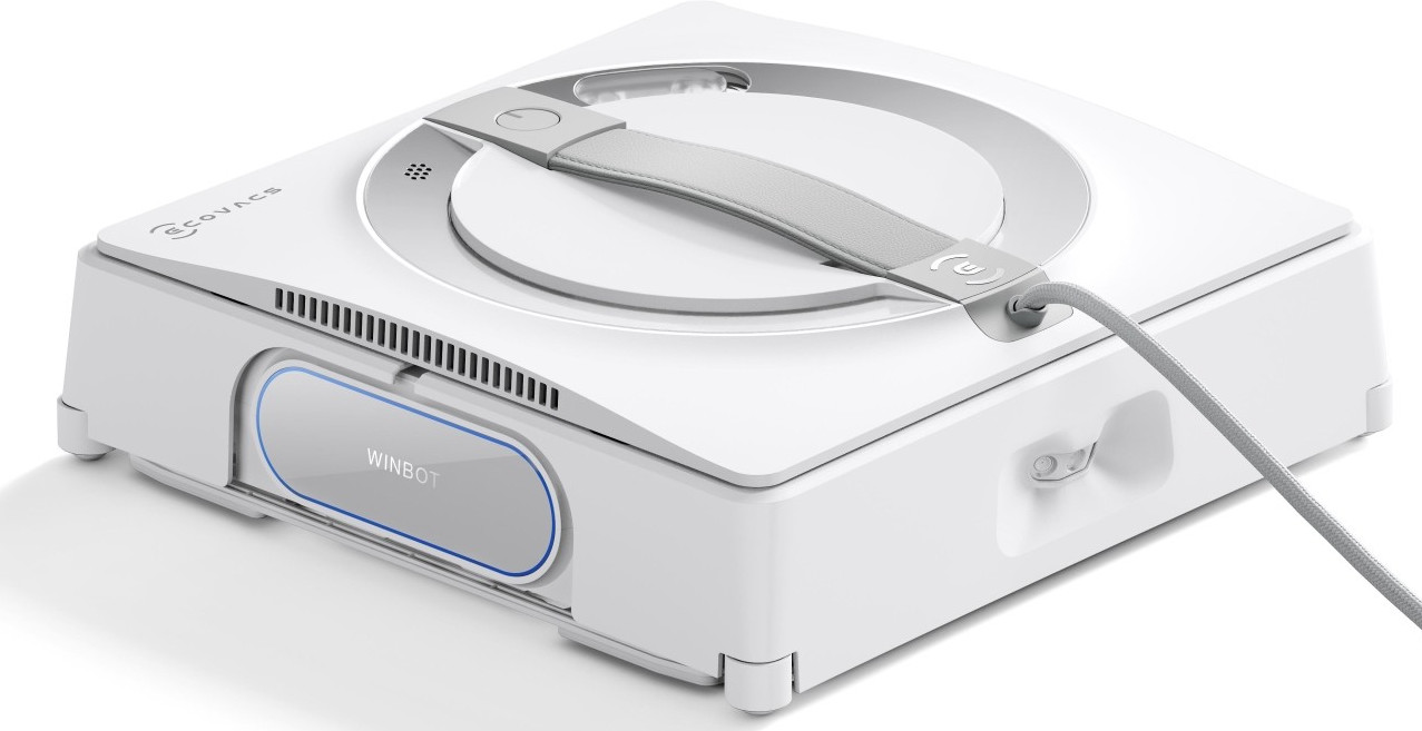 Biały odkurzacz automatyczny z uchwytem na białym tle.