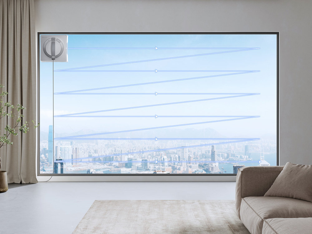 Robot do czyszczenia okien na oknie, z widokiem na miasto i ścieżką czyszczenia.