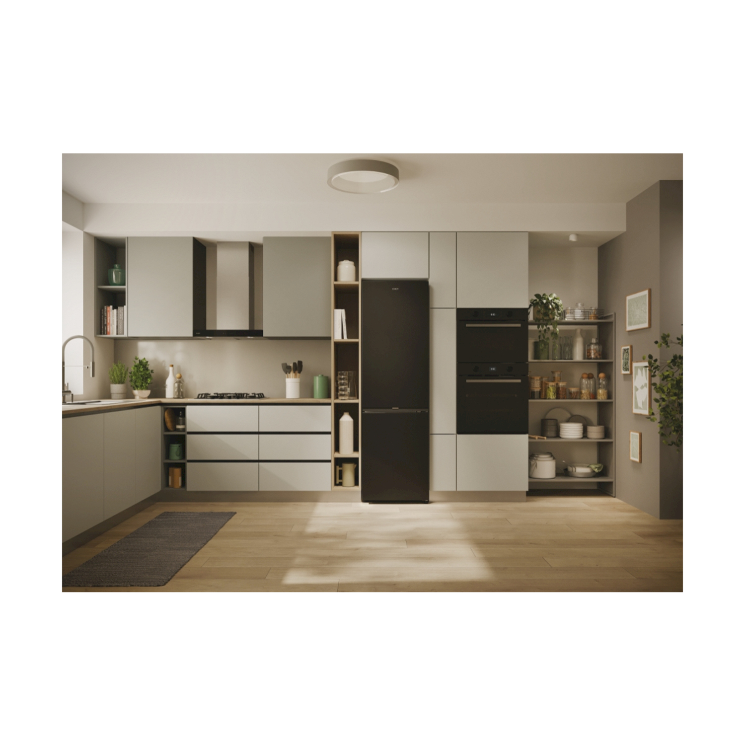 Una cucina moderna con un frigorifero nero e altri elettrodomestici.
