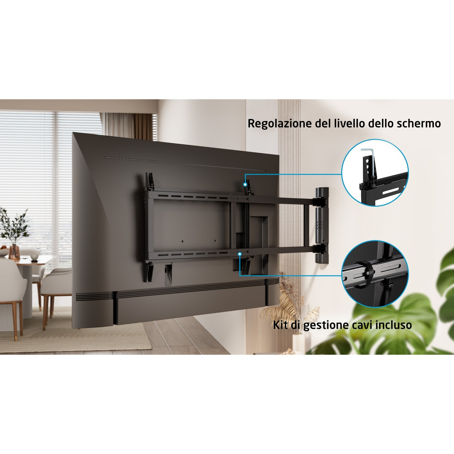 TV montata a parete con staffa. Kit di gestione dei cavi incluso. Pianta verde sullo sfondo.