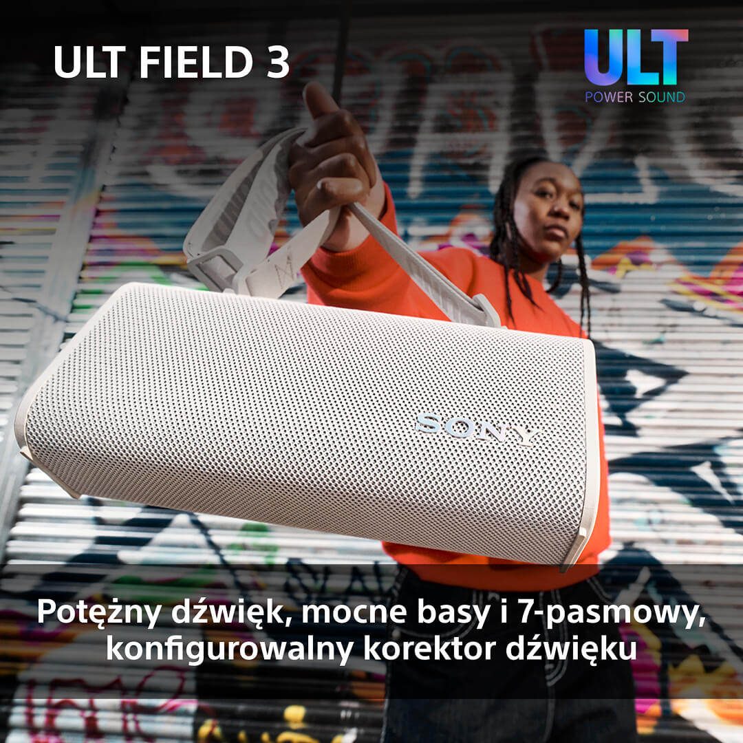 Osoba trzymająca biały głośnik Sony ULT FIELD 3, z tłem graffiti.