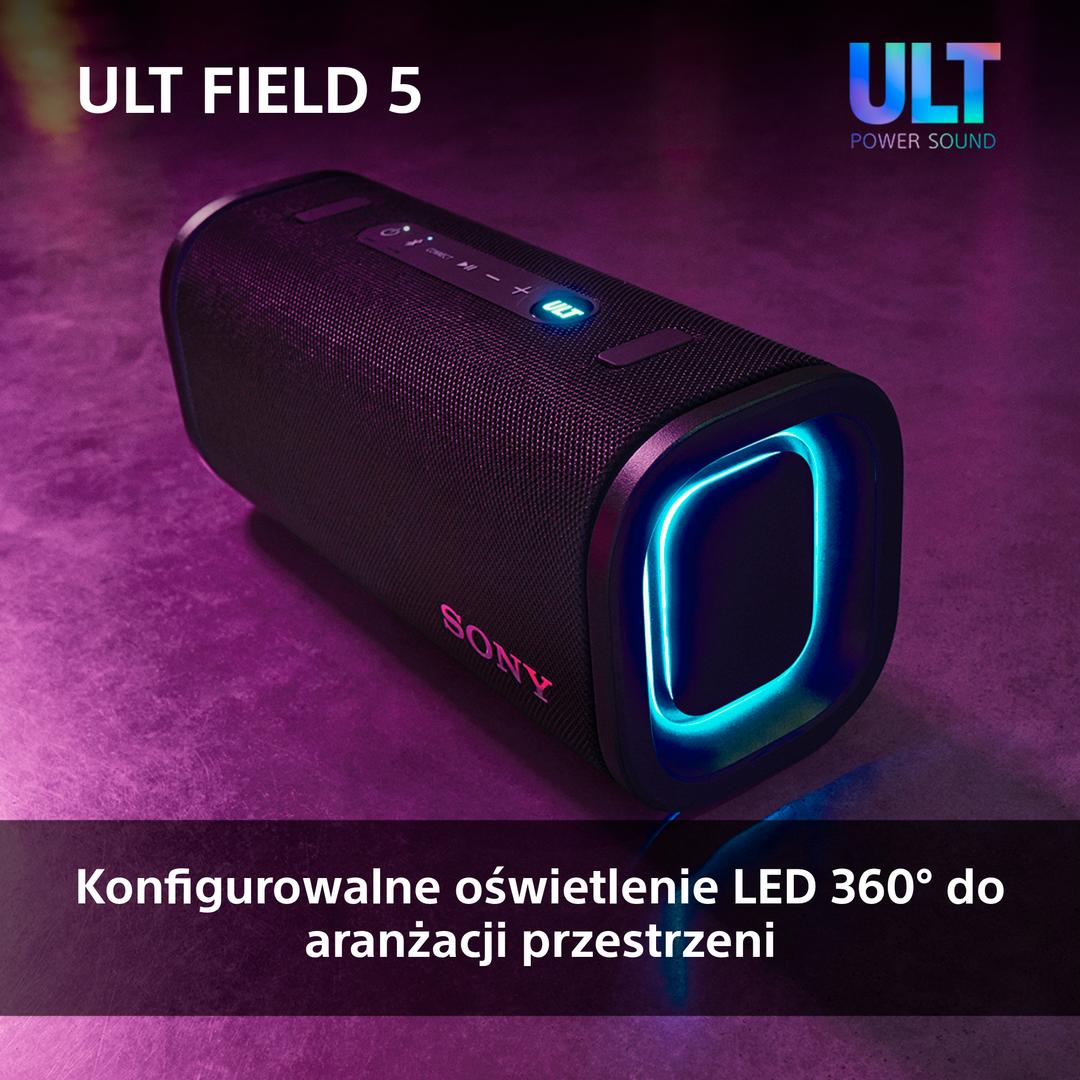 Czarny głośnik z niebieskim podświetleniem na fioletowej powierzchni. Głośnik ma napis SONY.