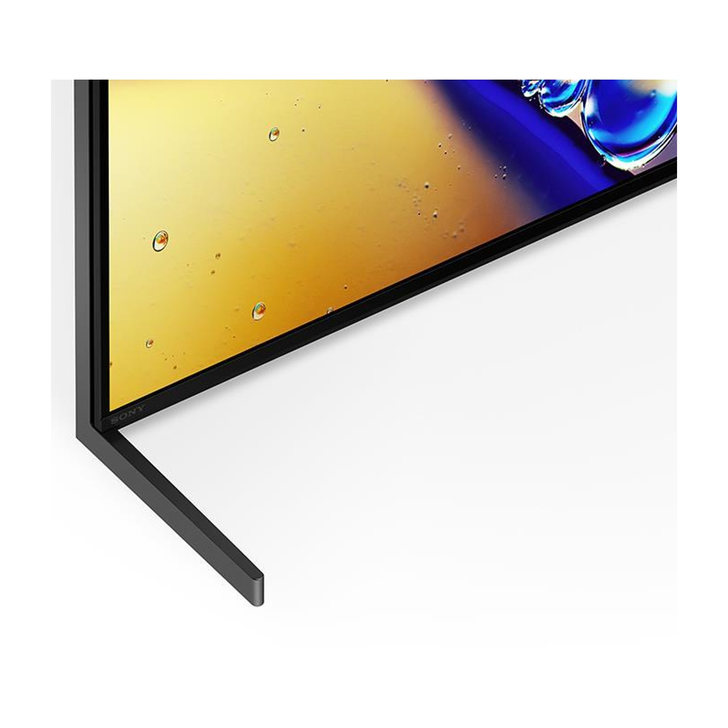 Primo piano di una TV nera con supporto nero. Lo schermo mostra un'immagine astratta gialla e blu.