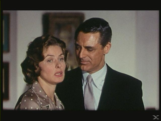 Ein Standbild aus einem Film mit einem Mann und einer Frau, die sich ansehen.