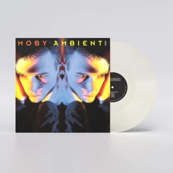 Albumcover von Moby Ambient: zwei gespiegelte Gesichter, Titel in Gelb, weiße Vinyl-Schallplatte rechts.
