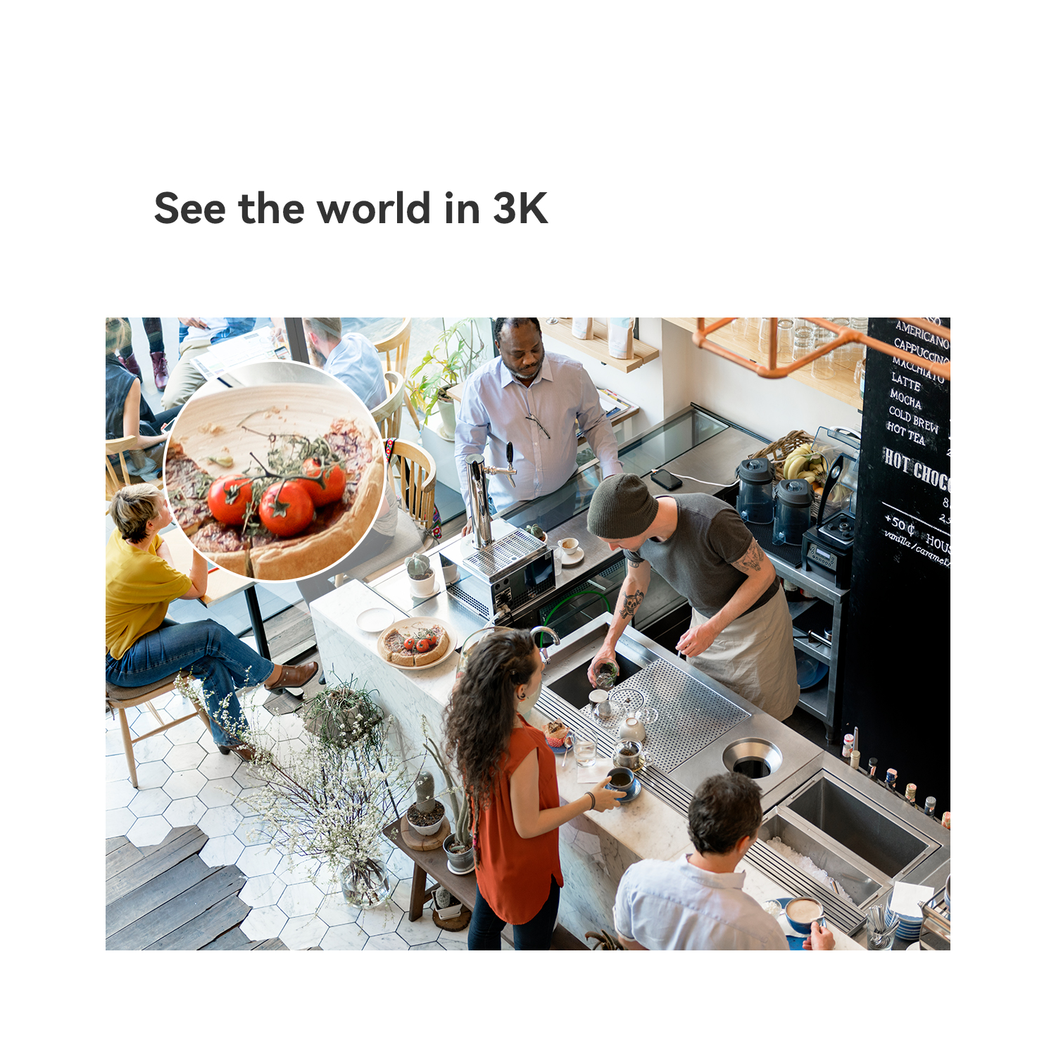 A coffee shop scene with people interacting, seen from above.