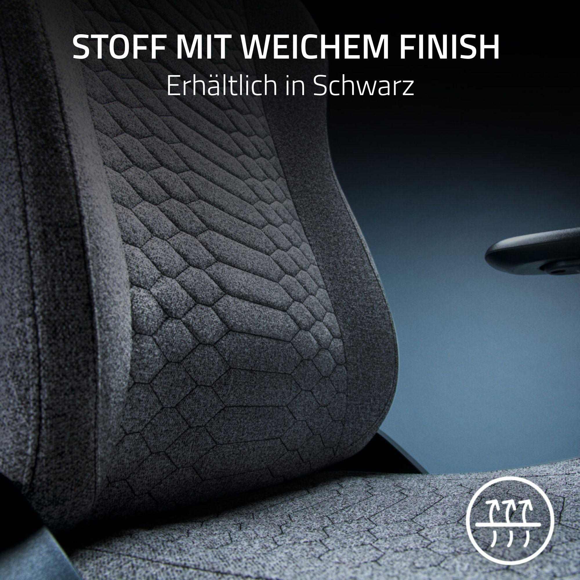 Nahaufnahme eines grauen Gaming-Stuhls mit strukturierter Sitzfläche und Rückenlehne. Text: Stoff mit weichem Finish.