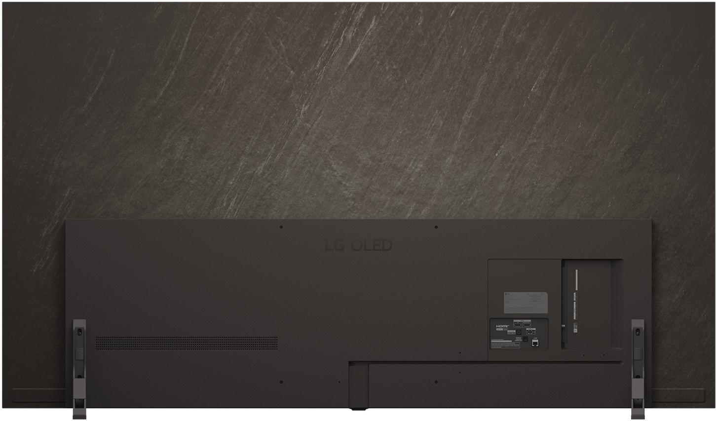 Rückseite eines dunkelgrauen LG OLED-Fernsehers mit Anschlüssen und Ständer. Der Hintergrund ist strukturiert, dunkelgrau.