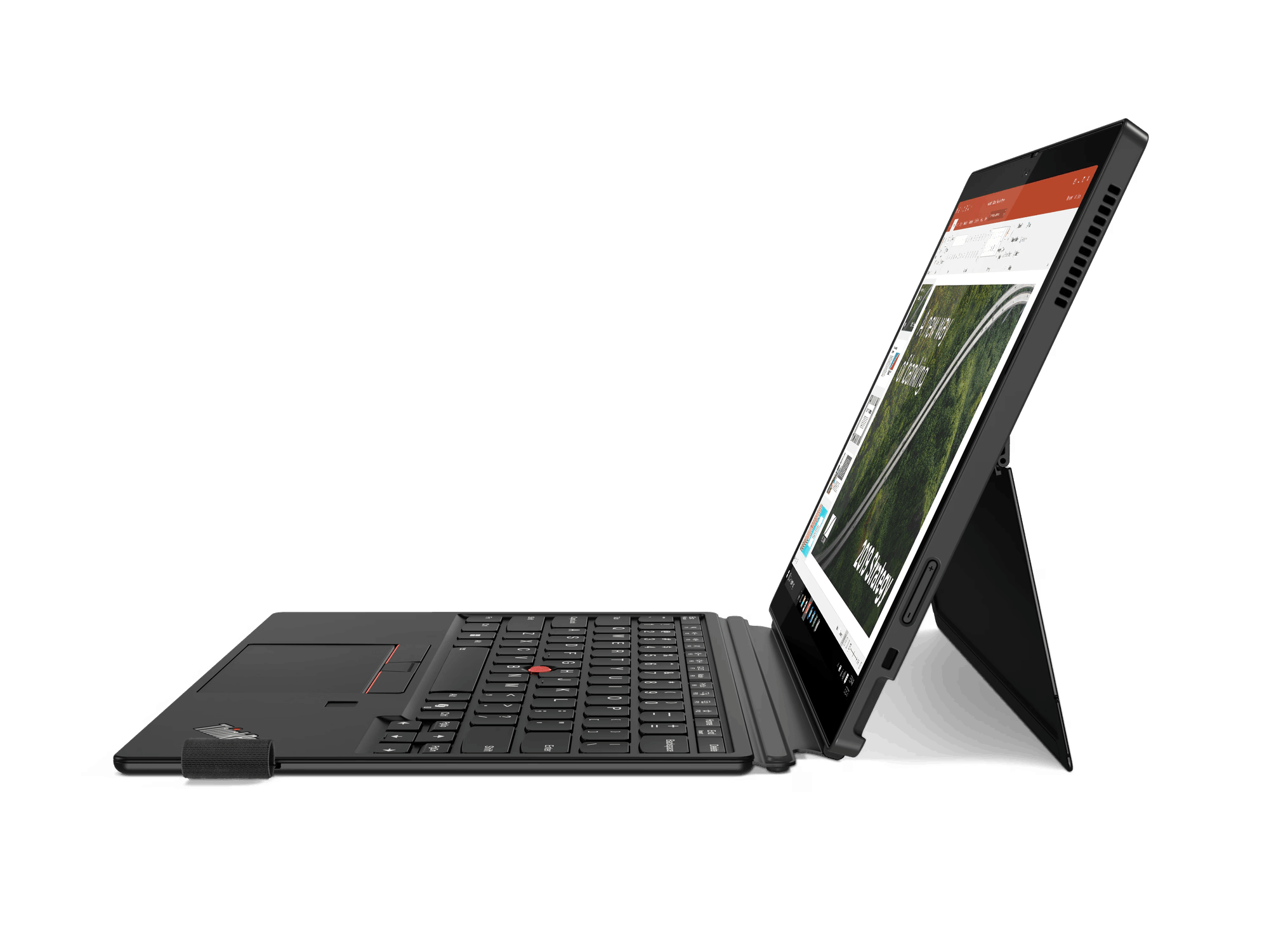 Laptop Lenovo negro abierto en una superficie negra, mostrando una presentación con una imagen de carretera.