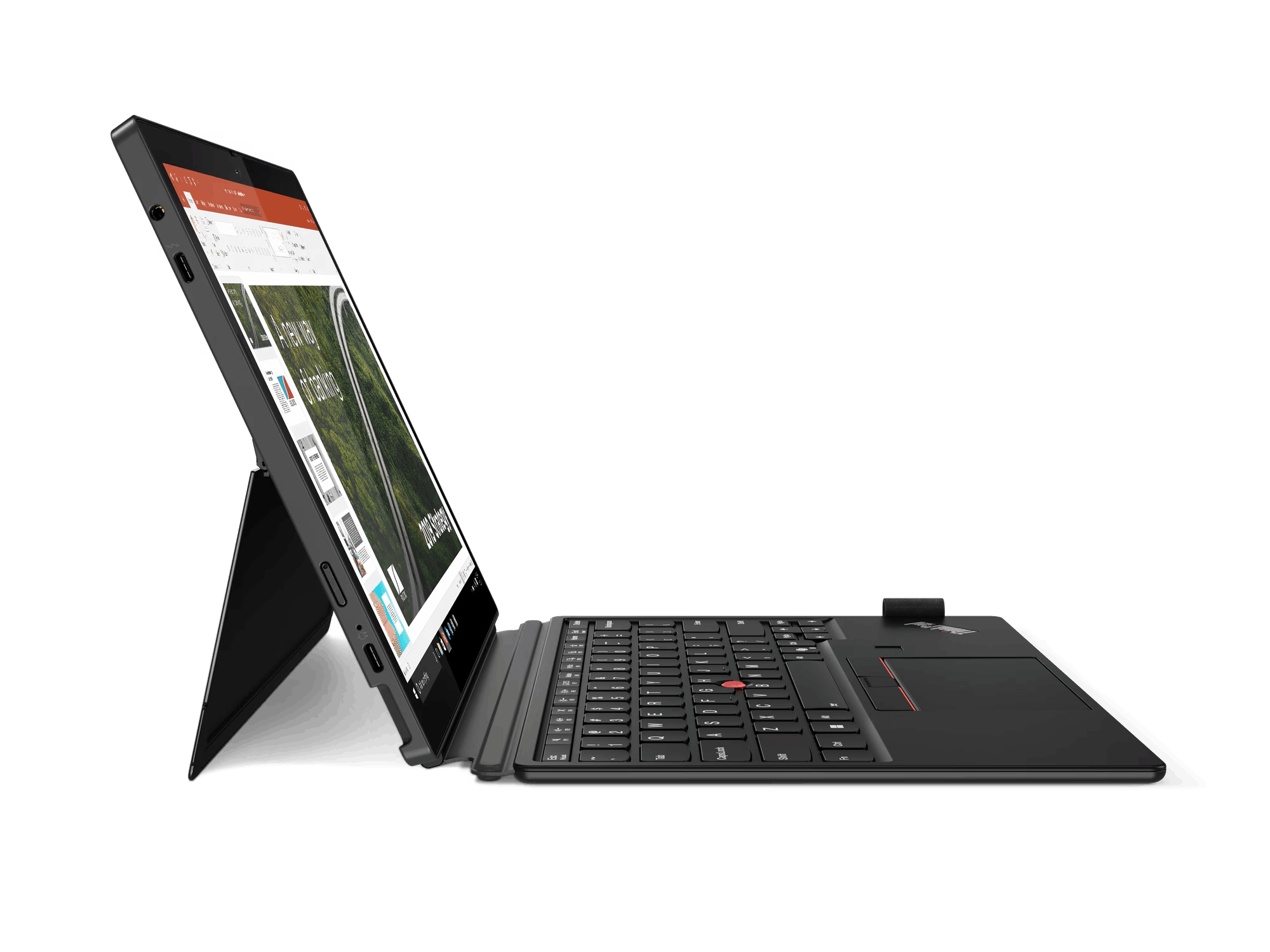 Tableta negra con teclado, apoyada sobre una superficie negra.