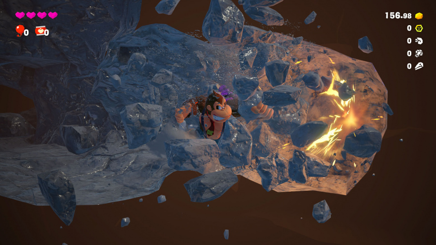 Scena z gry wideo z Donkey Kongiem w zaśnieżonym otoczeniu, z elementami interfejsu użytkownika.