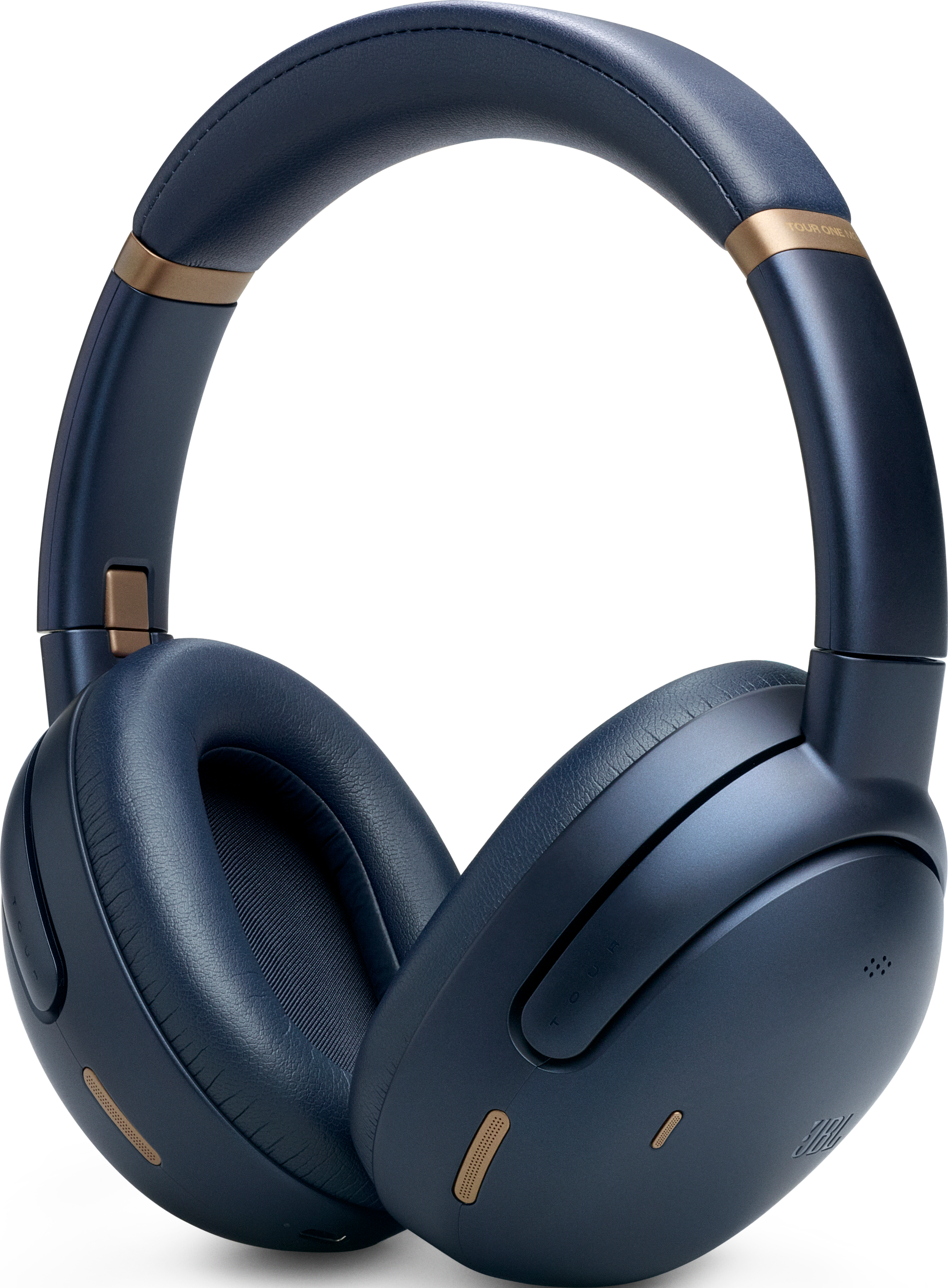 Cuffie blu navy con dettagli dorati. I padiglioni sono grandi e imbottiti. Marchio JBL visibile.