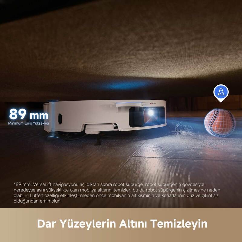 Robot süpürge, alçak bir yüzeyin altını temizliyor.