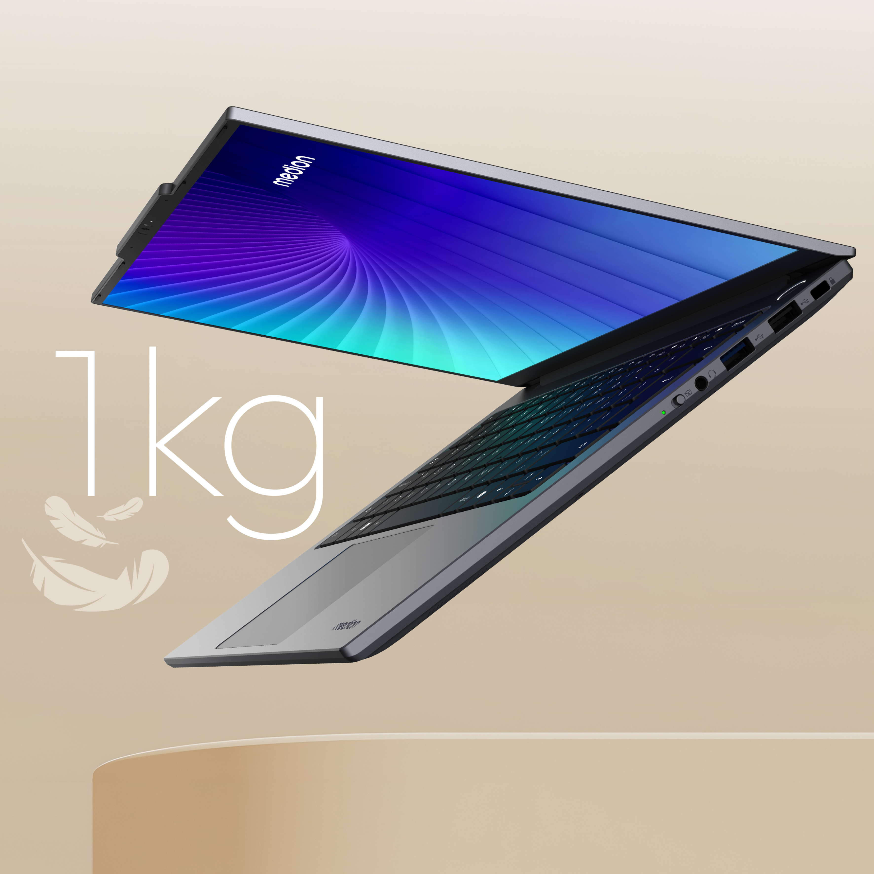 Ein silberner Laptop im Winkel mit blauem Bildschirm, Text '1kg' und Federn.