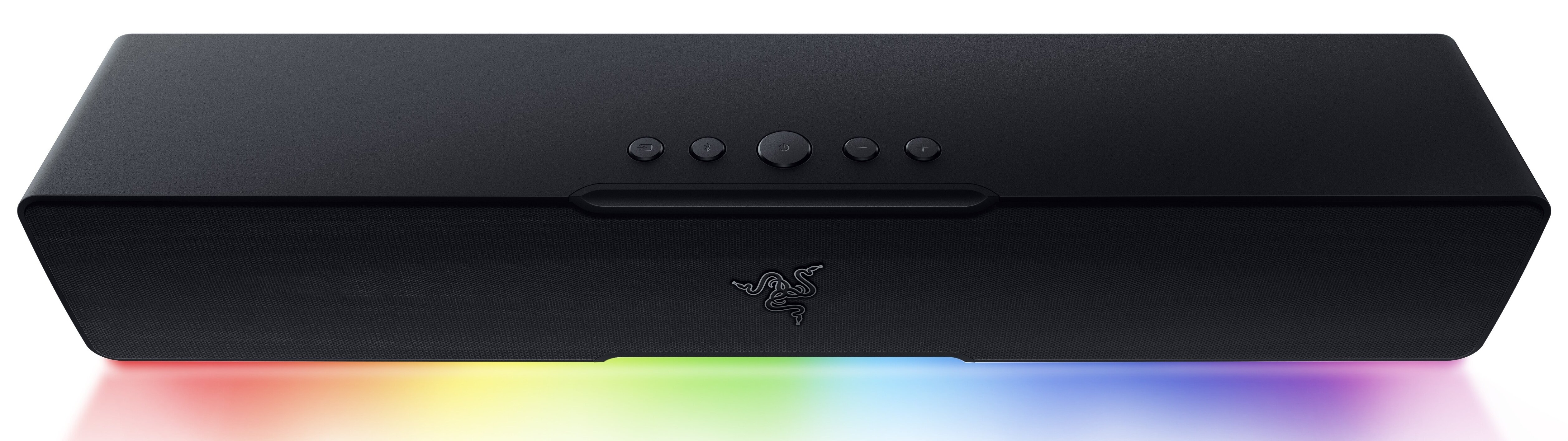 Czarny soundbar z przyciskami i logo. Podstawa emituje tęczę kolorów.