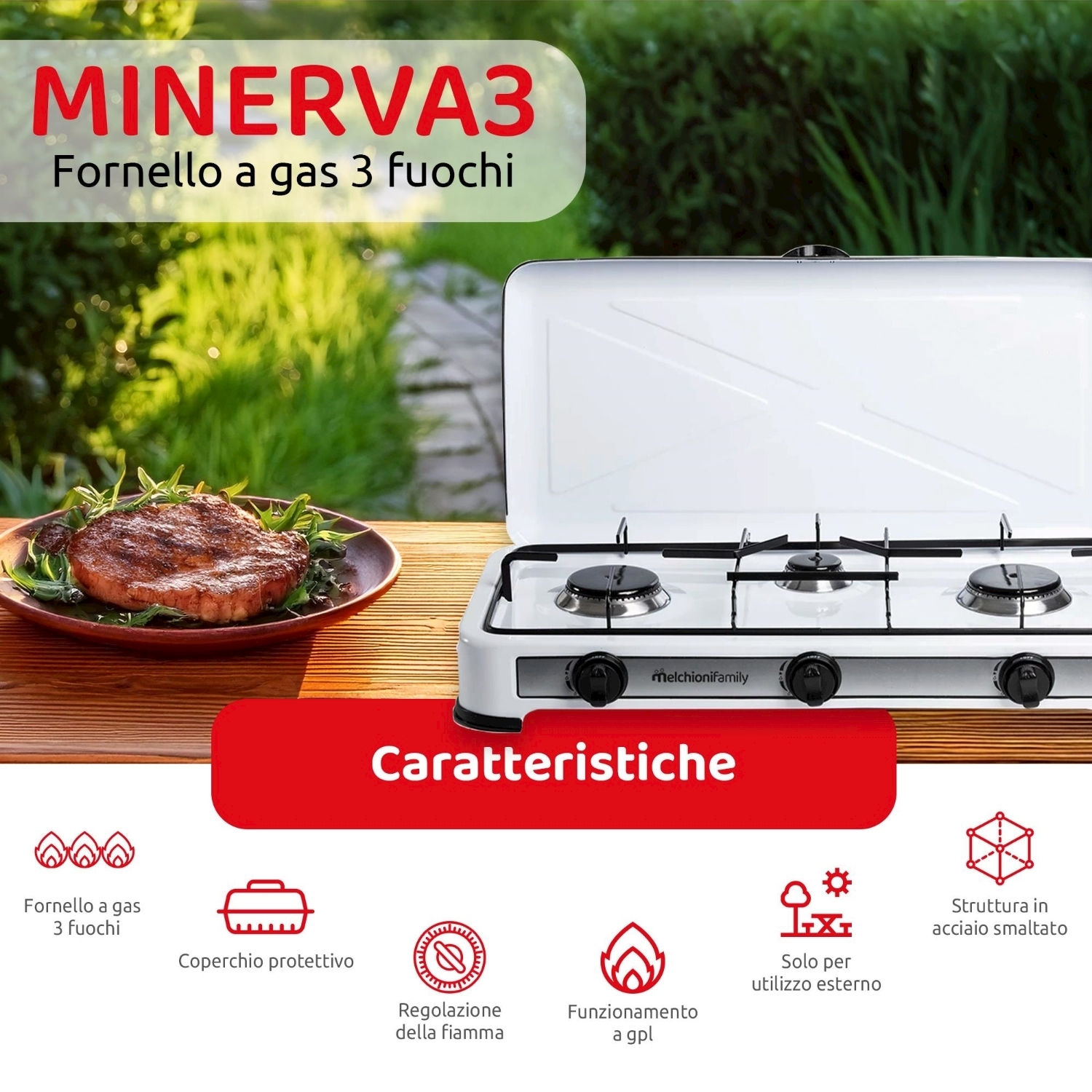 Un fornello a gas bianco con tre fuochi e una bistecca su un piatto sullo sfondo, all'aperto.