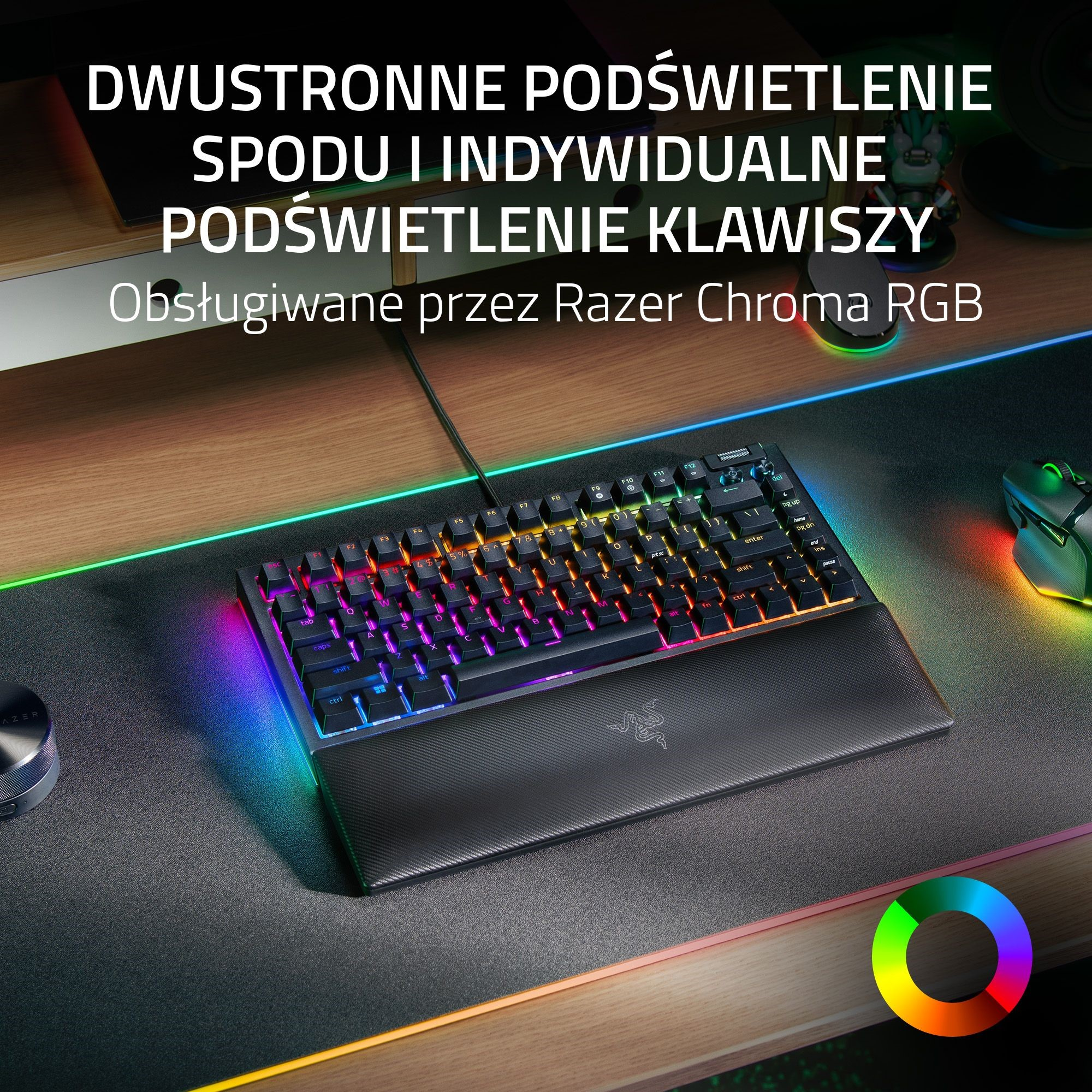 Klawiatura z kolorowymi światłami na macie z kolorowymi światłami i myszą.