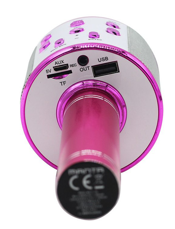 Różowo-srebrny mikrofon do karaoke, pokazujący porty AUX, USB i inne wejścia/wyjścia.