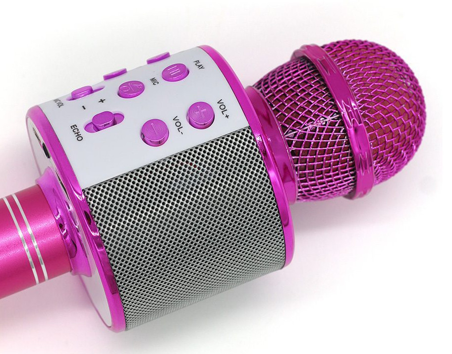 Różowo-biały mikrofon do karaoke, skierowany w prawo.