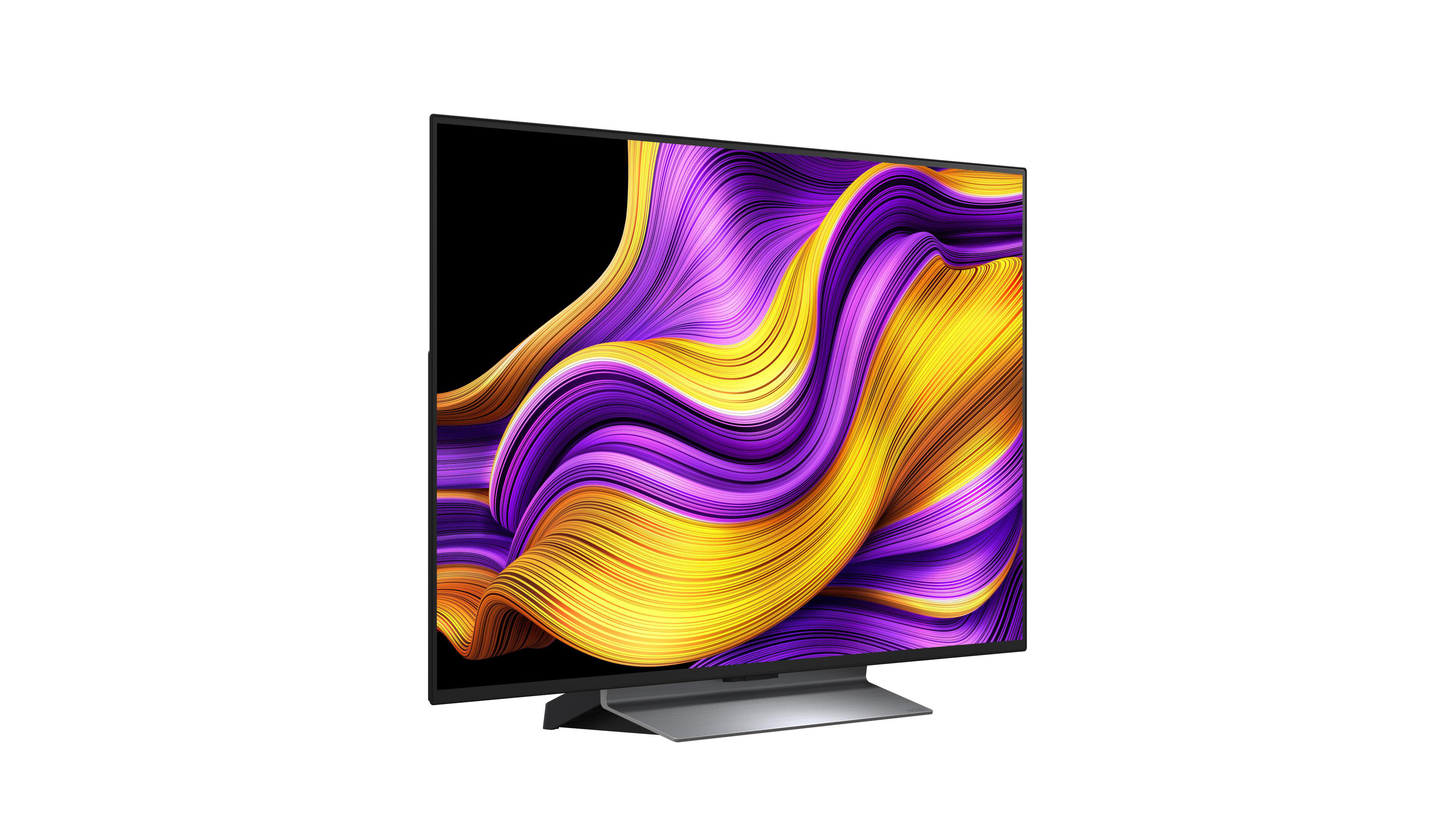 Ein moderner Fernseher mit farbenfroher abstrakter Anzeige und silbernem Ständer.