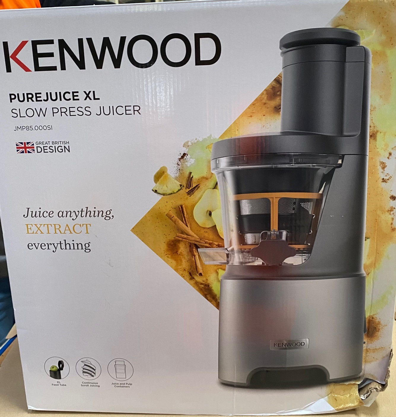 Pudełko wyciskarki wolnoobrotowej Kenwood PureJuice XL z ilustracją urządzenia.