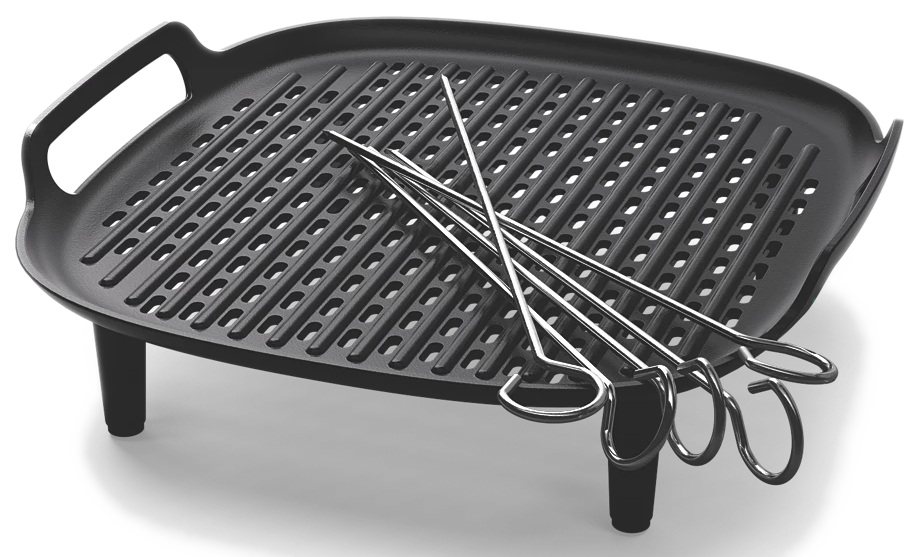 Czarny prostokątny grill z podniesionymi grzbietami i metalowymi szpikulcami na wierzchu.