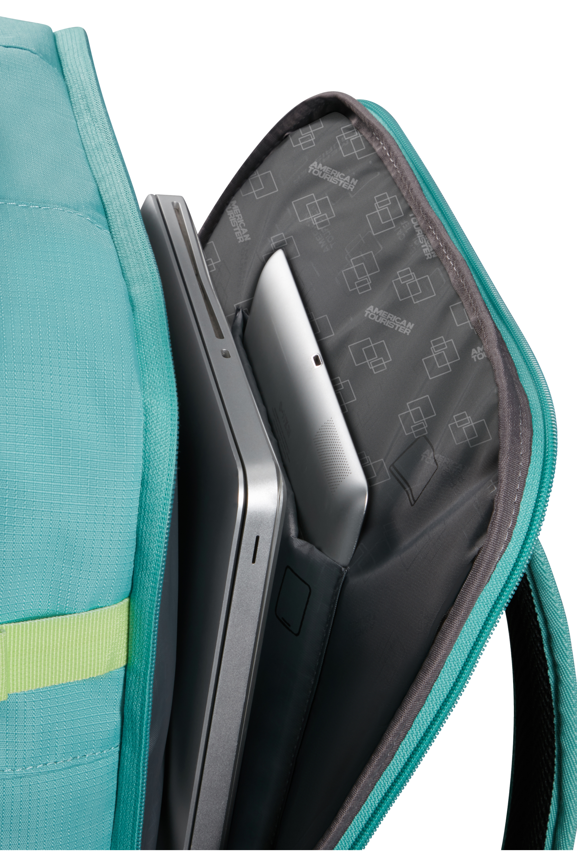 Nyitott hátizsák laptop-pal és tablettel. Türkiz és lime zöld díszítések.