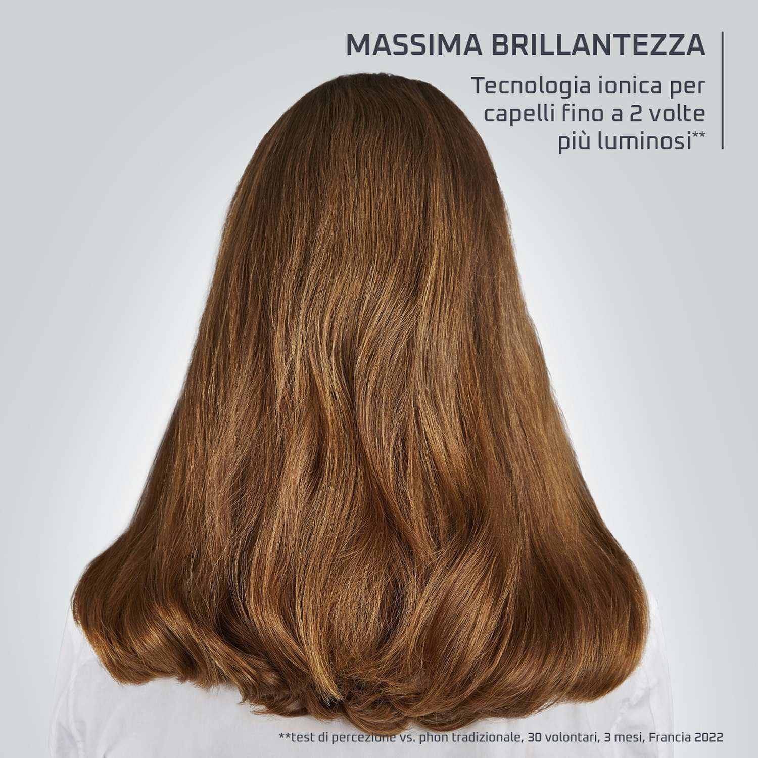 Capelli castani di donna, vista posteriore, testo del prodotto in italiano.