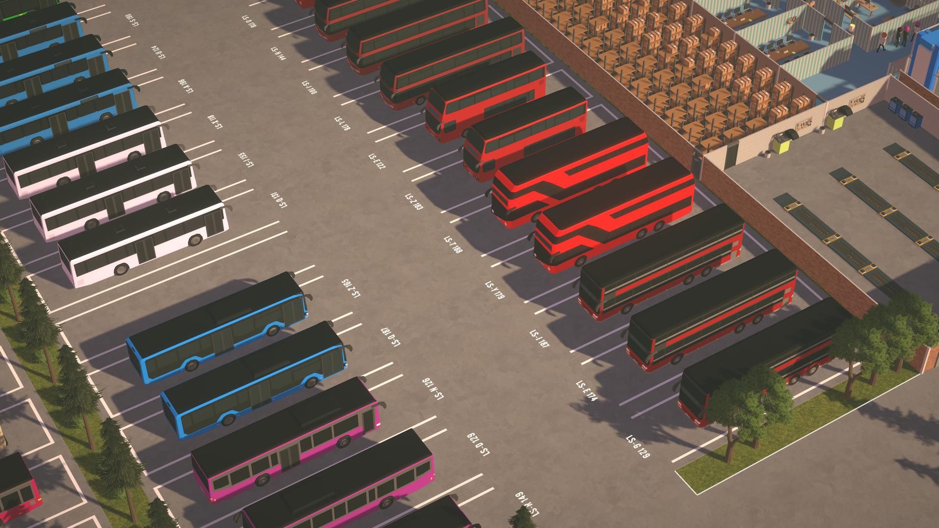 Eine Vogelperspektive eines Parkplatzes voller Busse.