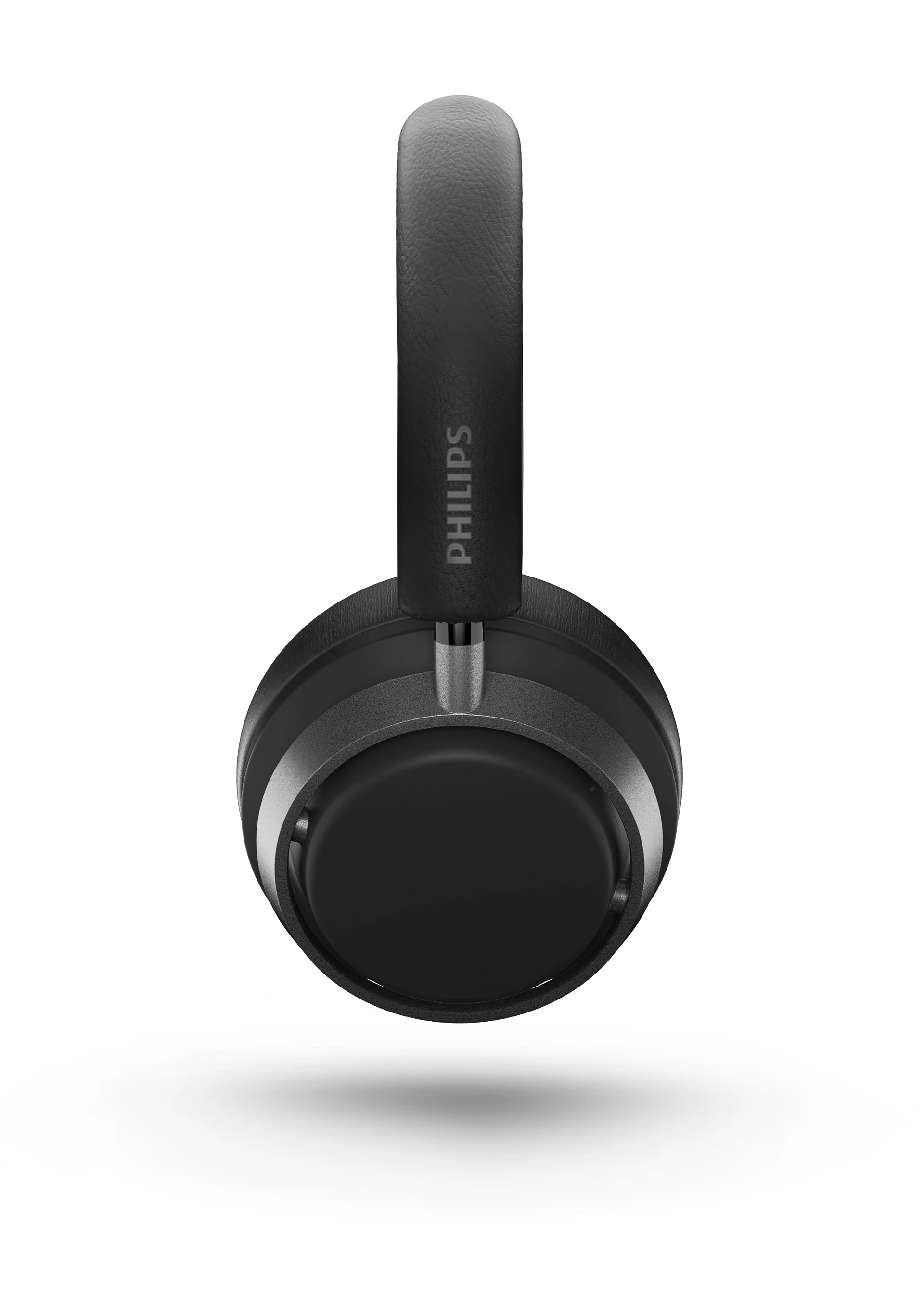 Beyaz bir arka plan üzerinde bir kafa bandı ve kulaklıklara sahip siyah Philips kulaklıklar.