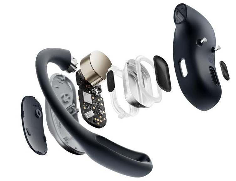 Widok rozłożony czarnego i srebrnego dousznika z widocznymi elementami wewnętrznymi.