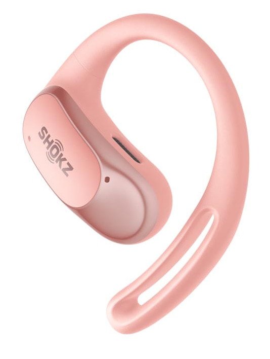 Różowe słuchawki Shokz, zakrzywiony kształt zaprojektowany dla ucha, z kontrolkami.