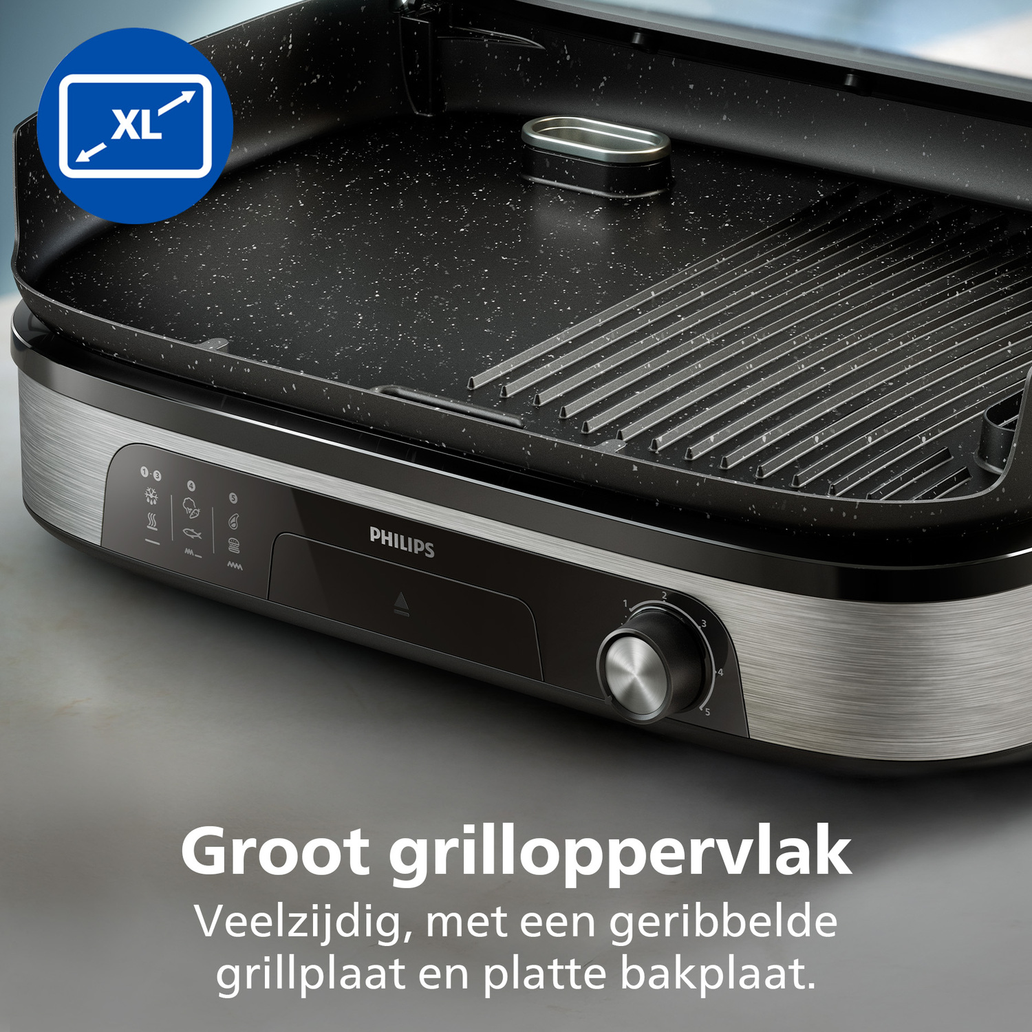 Close-up of a Philips electric grill with an XL logo. It has a black cooking surface, a control panel, and a silver base.
