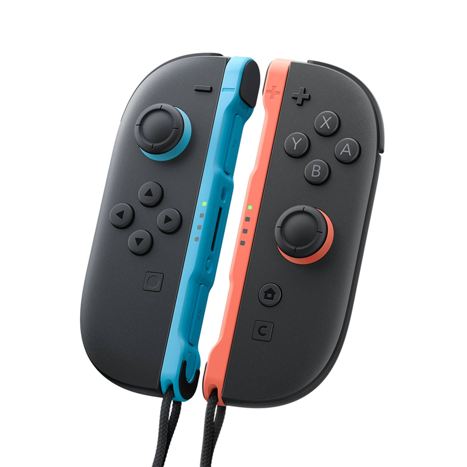 Deux manettes grises Nintendo Switch, une bleue, une orange, avec des sangles noires, sur fond blanc.