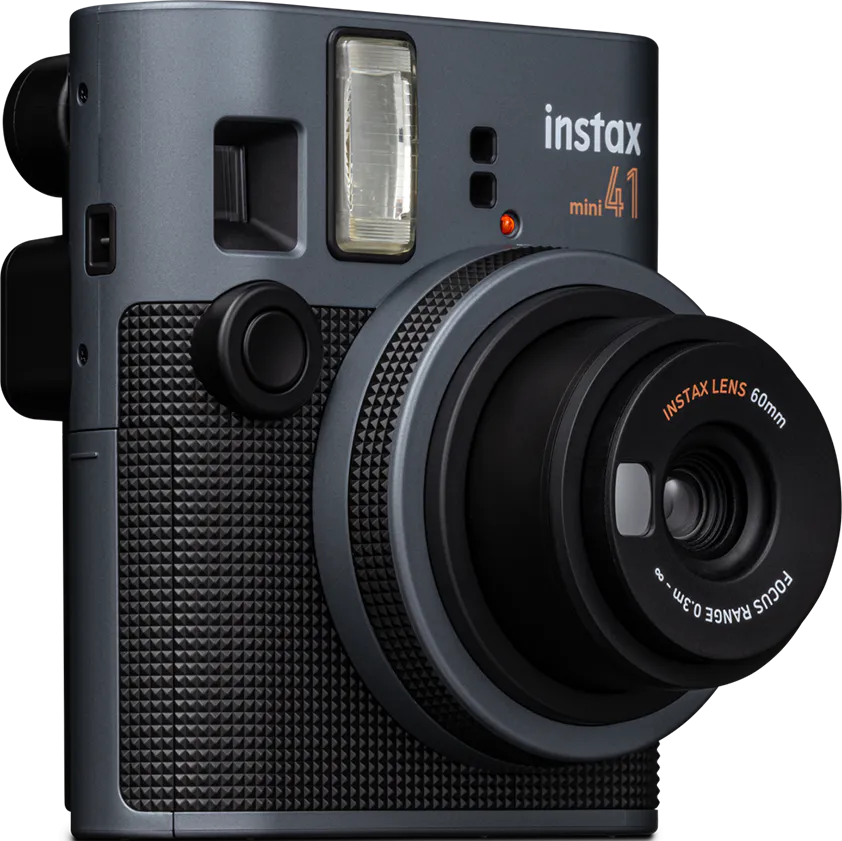 Graue Instax Mini 41 Kamera mit schwarzem Objektiv und Blitz.