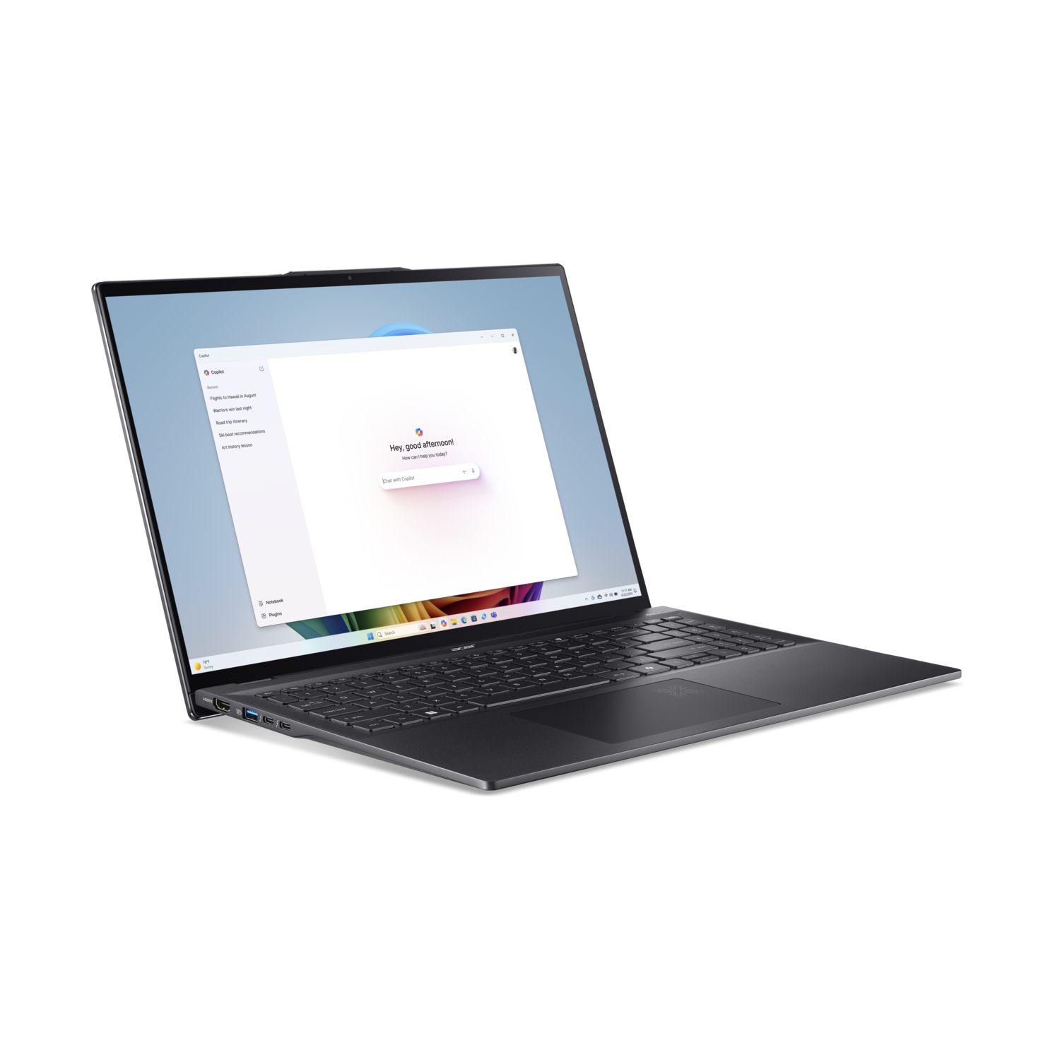 A laptop, open with a white window and a keyboard, on a black surface.