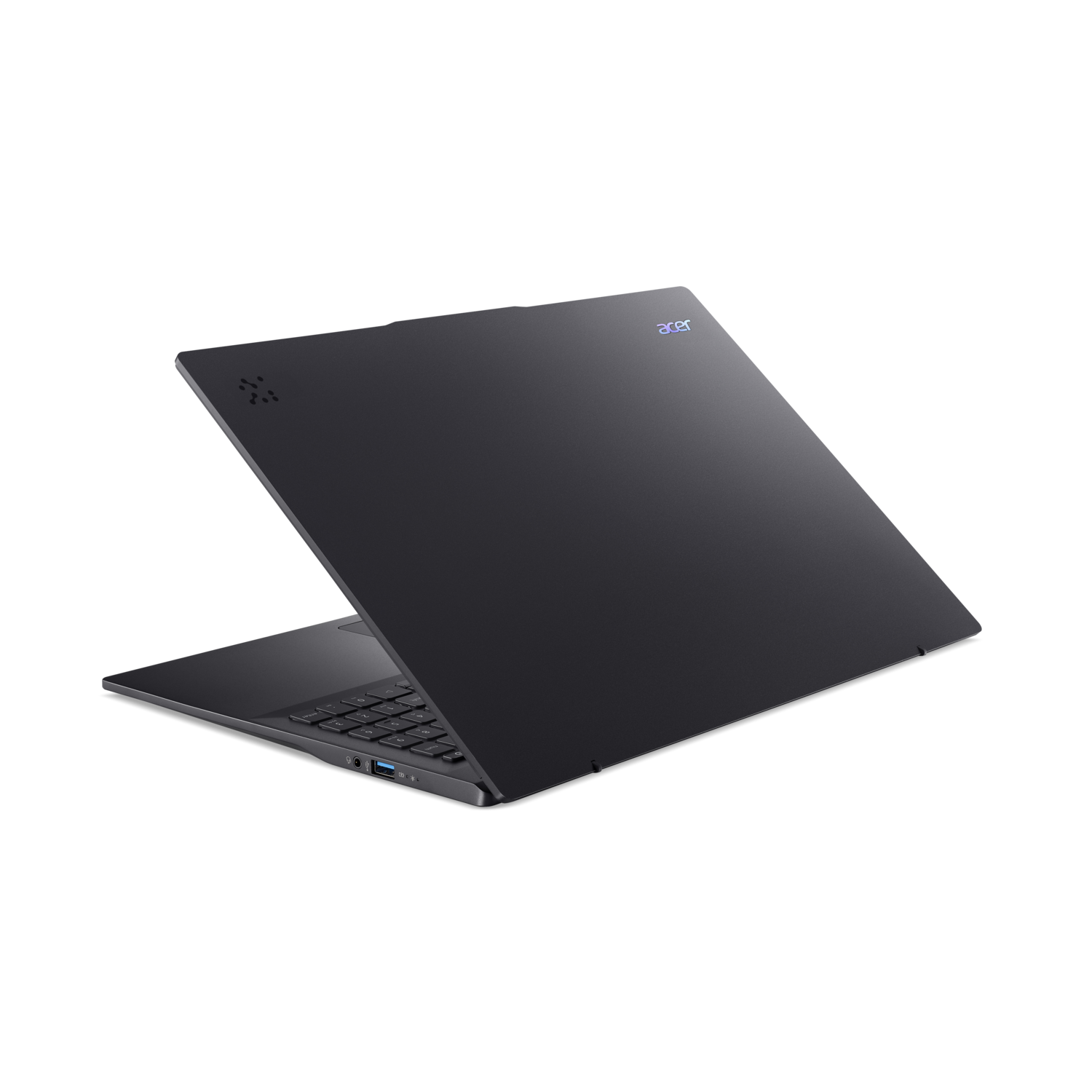 Black laptop on a black background. The screen is open and the keyboard is visible.