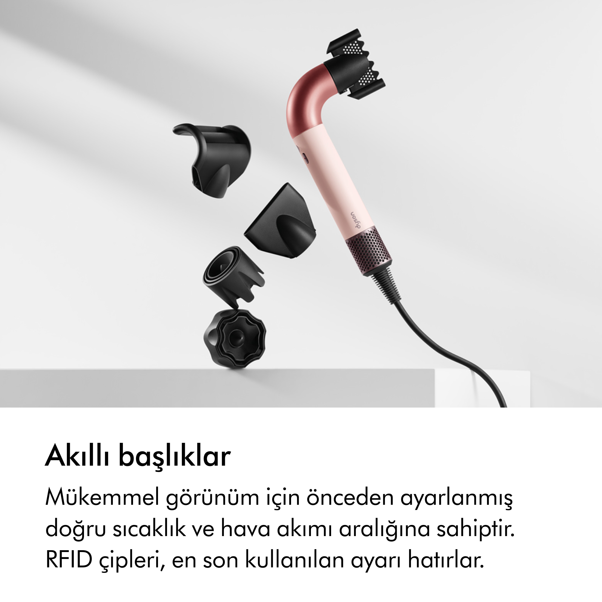Ekleri olan pembe ve bakır saç kurutma makinesi. Ayarlar ve özellikler hakkında Türkçe metin.