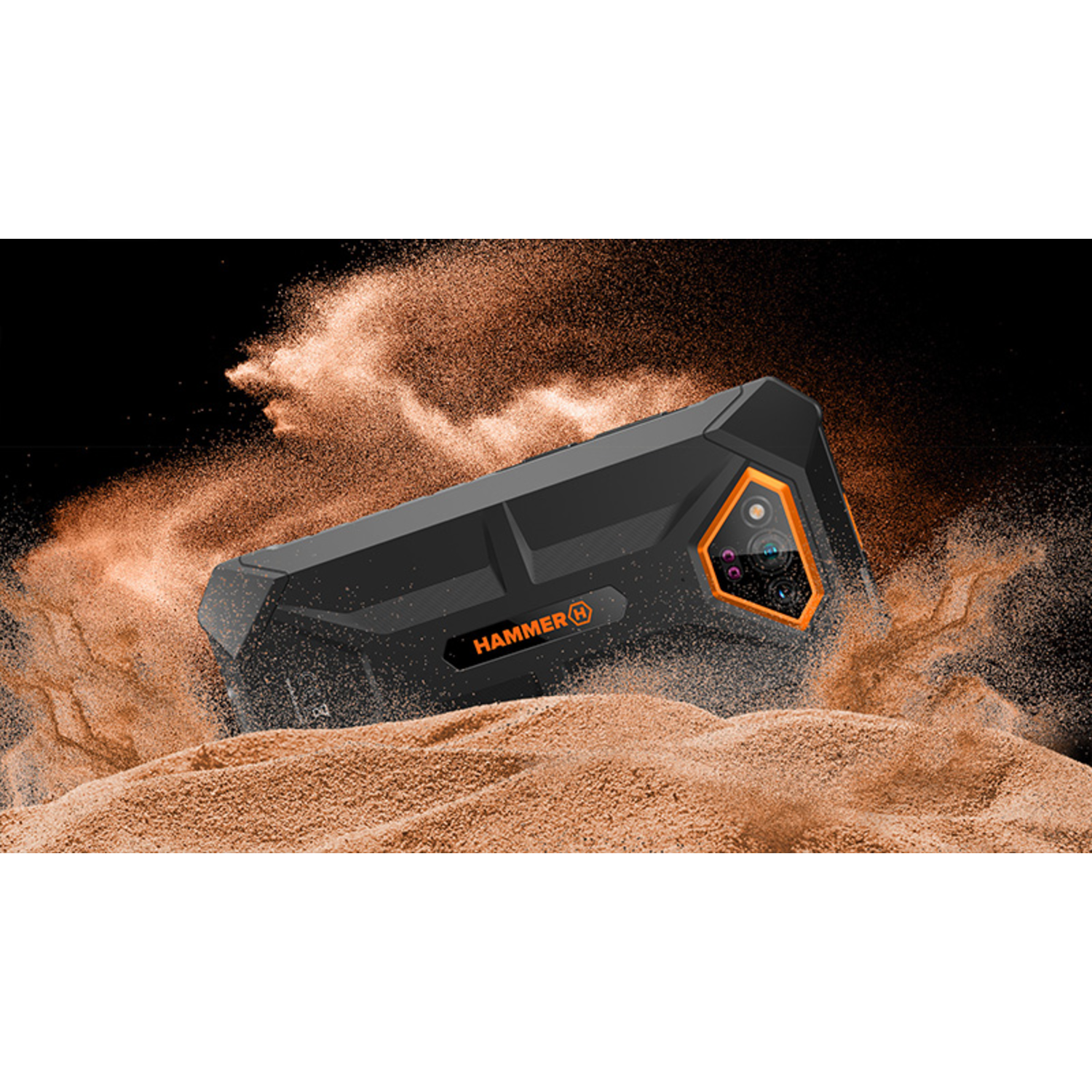 Black and orange rugged smartphone in sand with dust particles. The phone has camera and the brand name HAMMER.