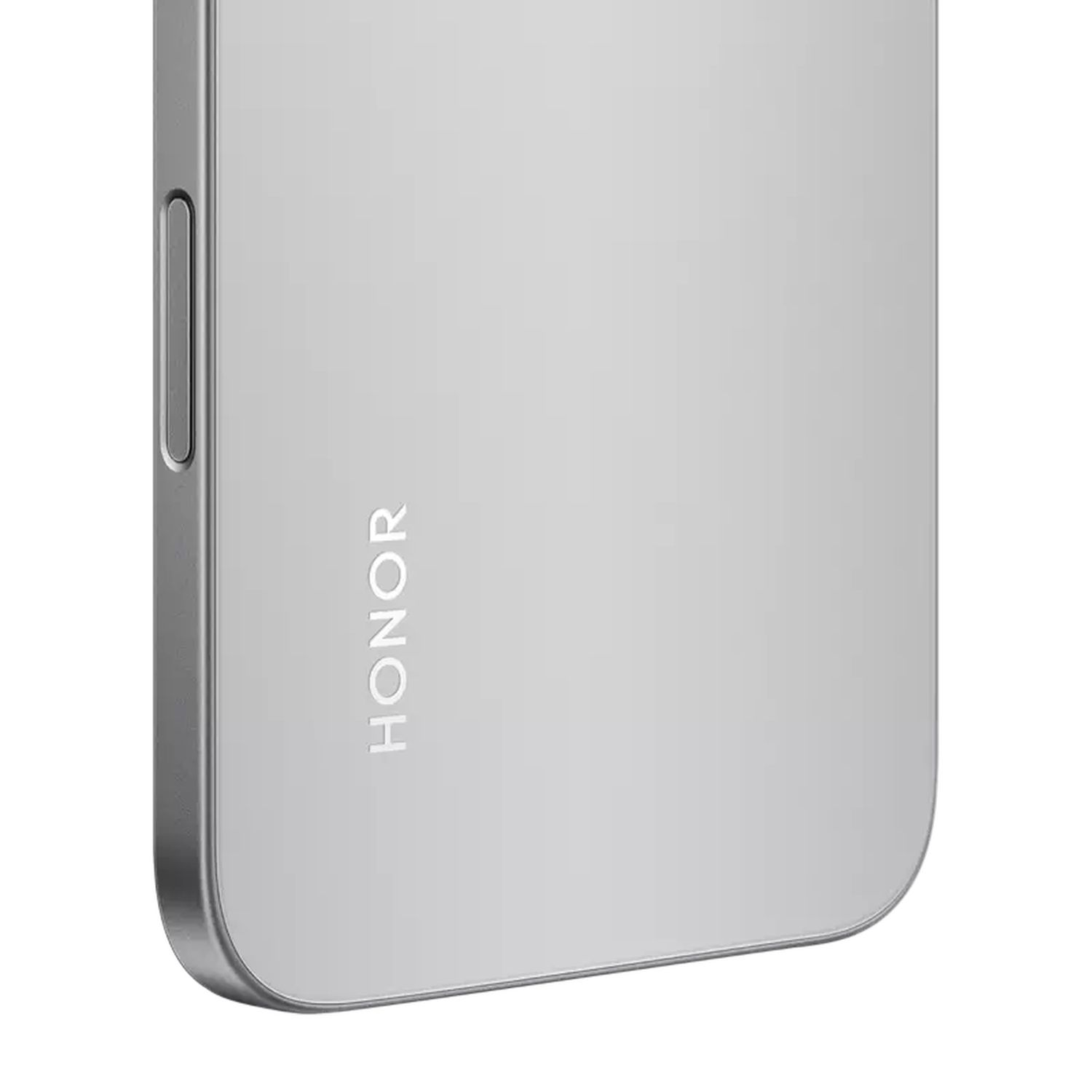 Close-up of a silver phone with the word HONOR on it.