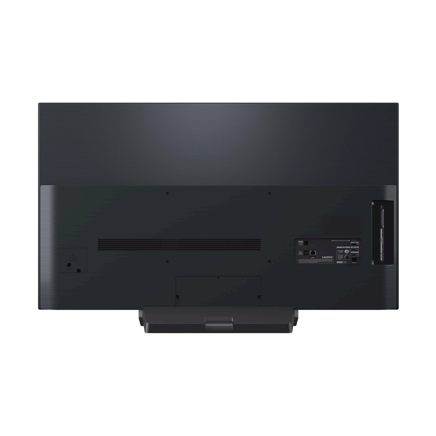 Retro di una TV nera con varie porte e un supporto nero.