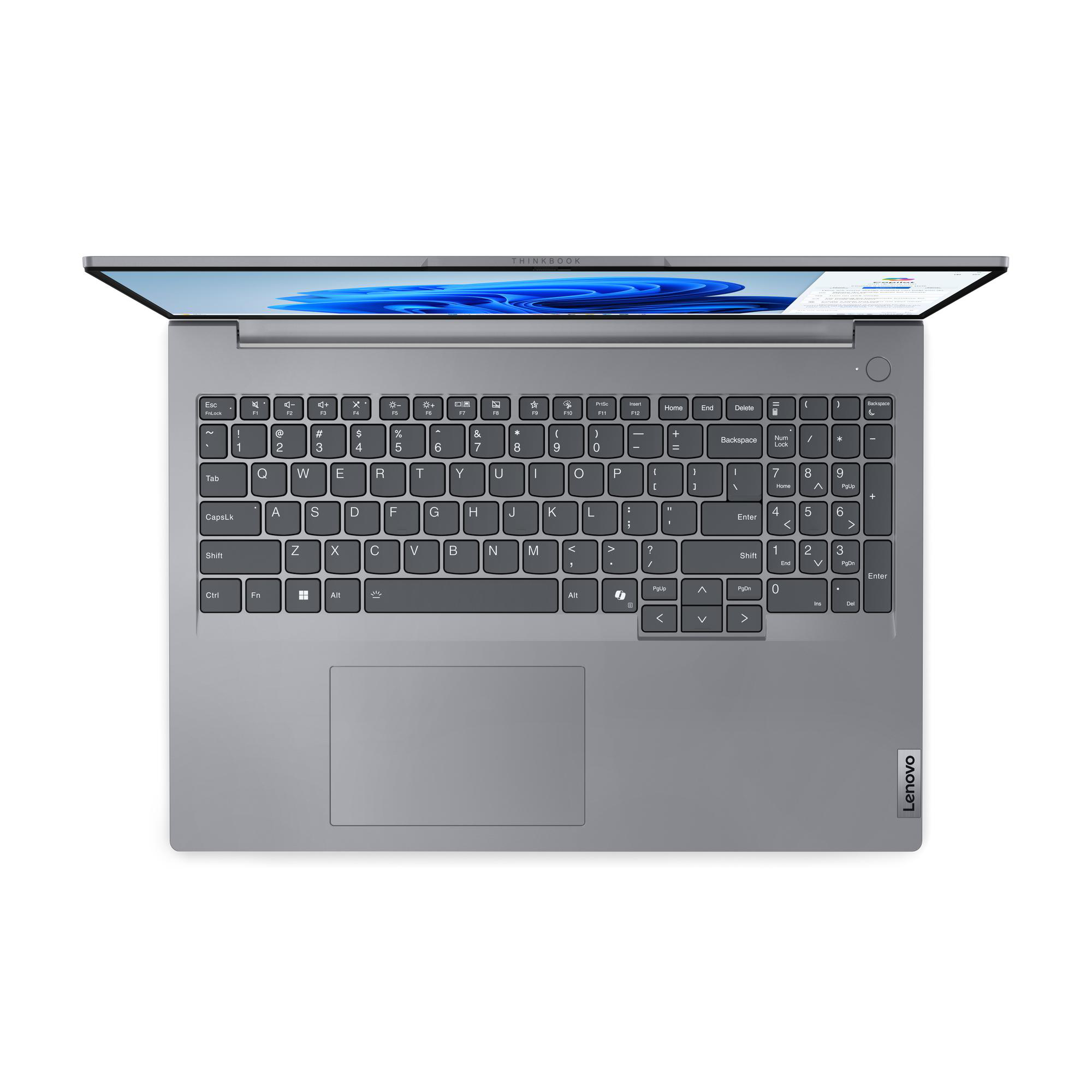 Laptop, Draufsicht, offen auf Weiß. Tastatur sichtbar, Lenovo-Logo und Windows-Oberfläche.