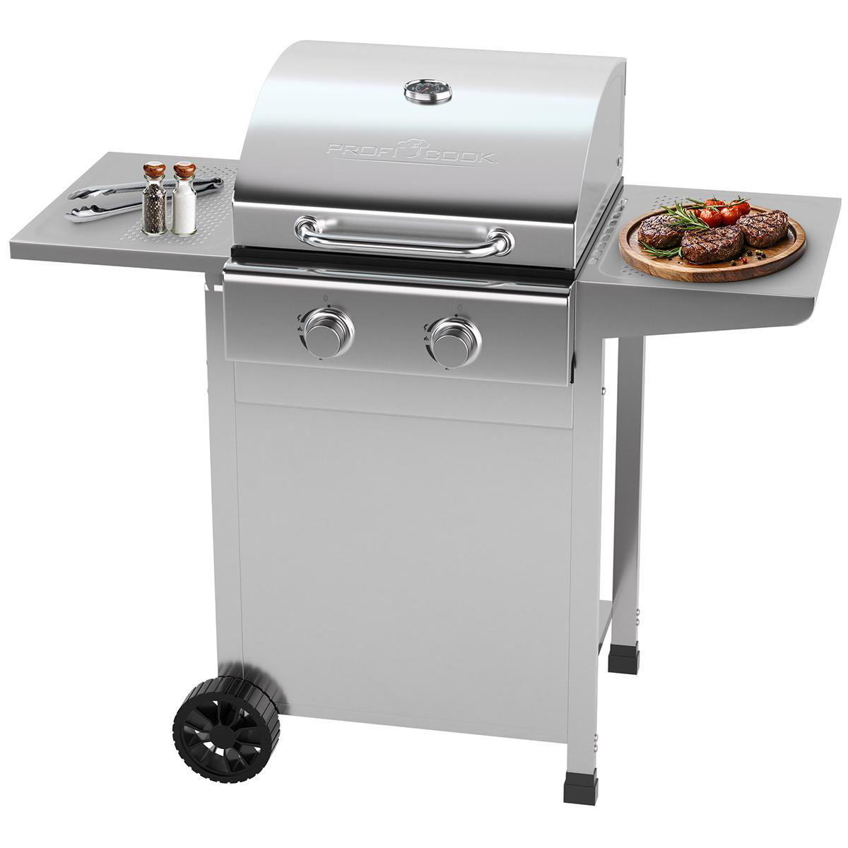 Silberner Grill mit Seitenablagen. Eine Ablage hat Zangen und Gewürze, die andere Essen.