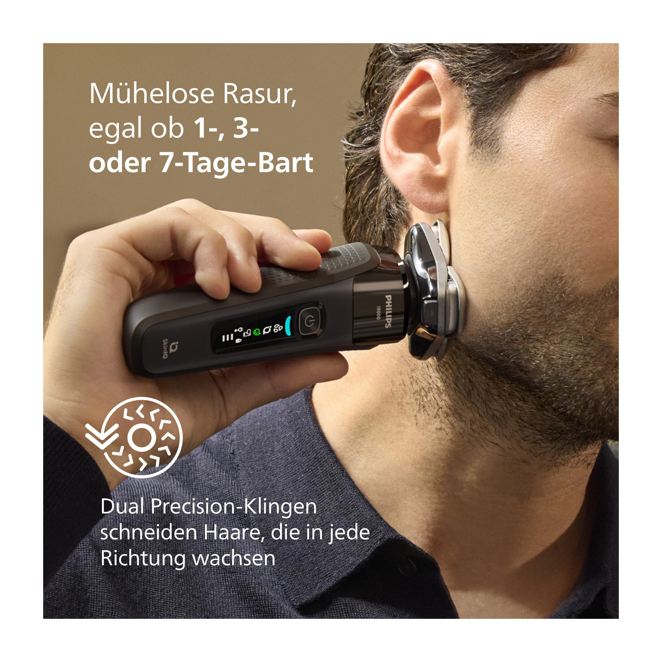 Ein Mann rasiert sein Gesicht mit einem elektrischen Rasierer, Nahaufnahme.