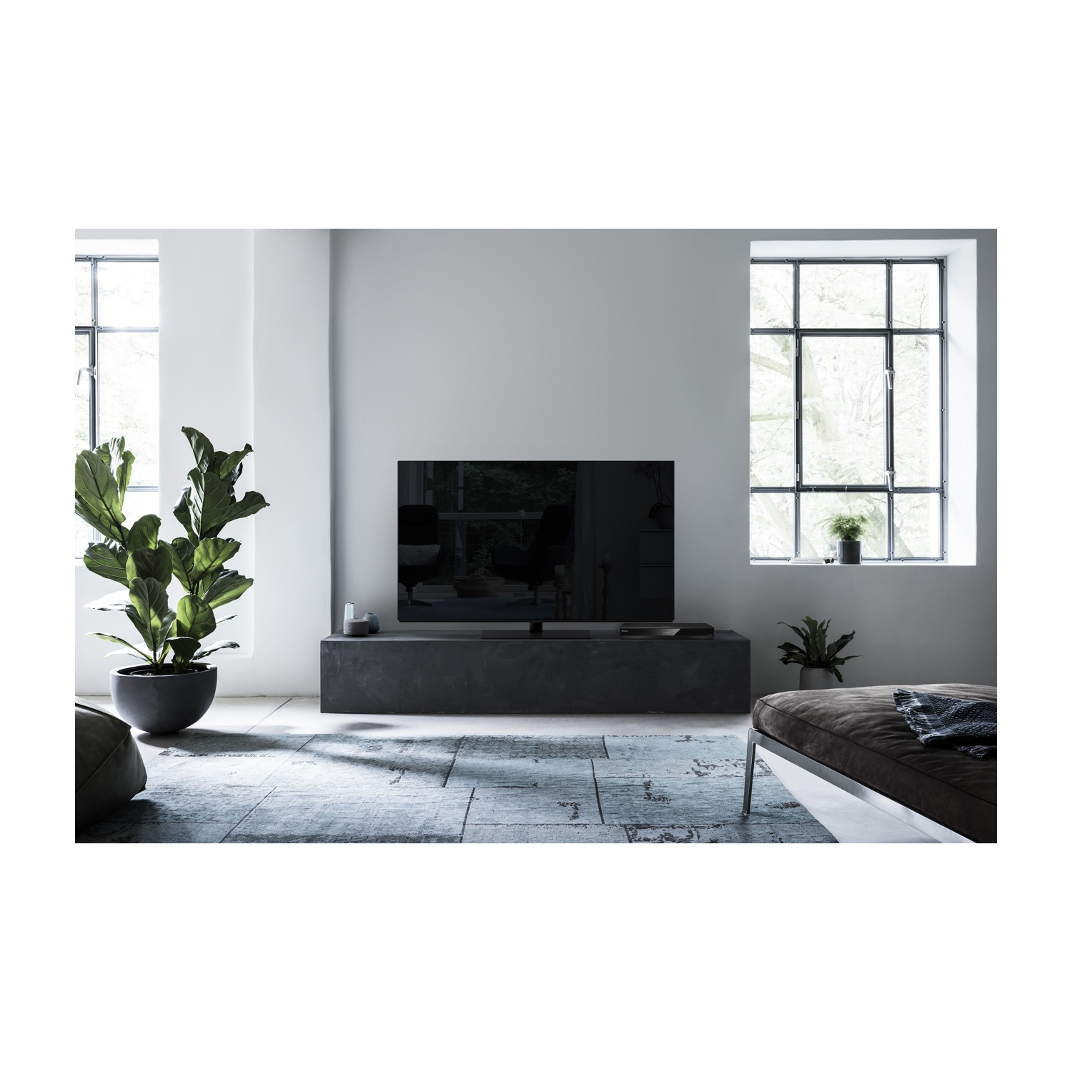 Scatola rettangolare bianca con testo nero, con ombra.