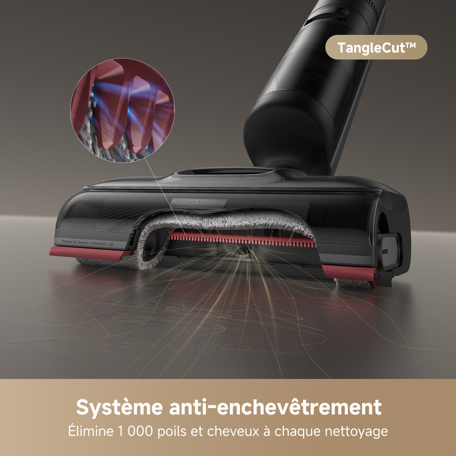 Tête d'aspirateur noire montre parties internes, brosse rouge, avec cheveux et texte.