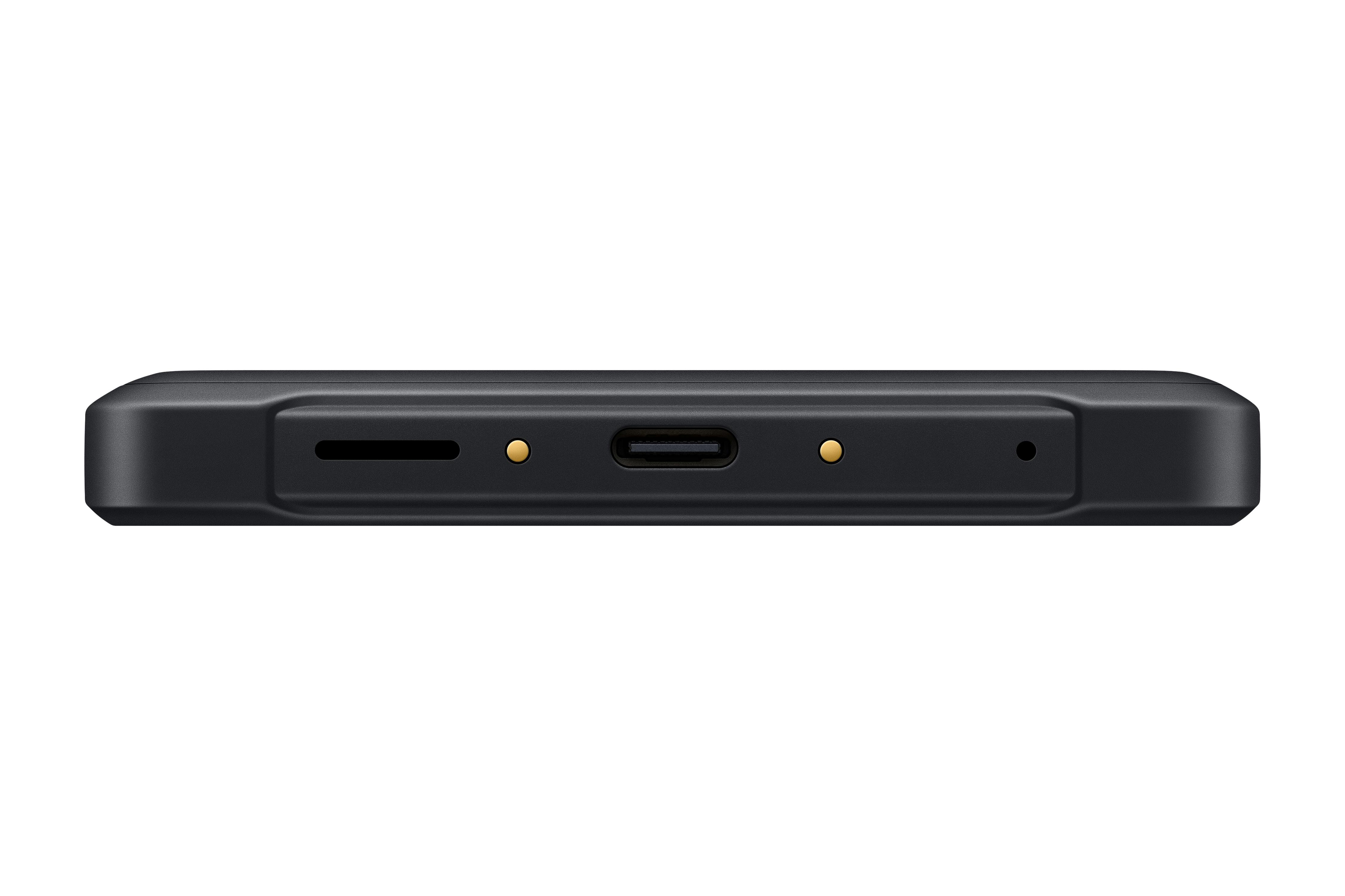 Die Seite eines schwarzen Geräts mit Anschlussports für SD-Karte, USB und Strom.